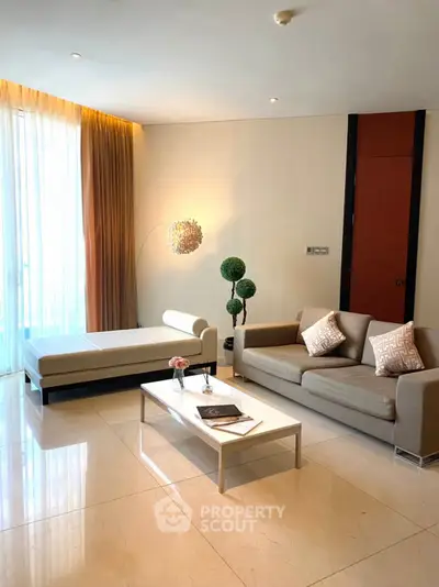 Elegant modern living room with stylish furniture and natural light