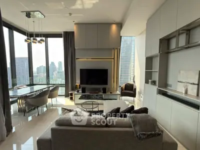 Luxurious modern living room with panoramic city views and elegant furnishings.