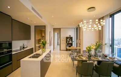 Luxurious open-plan kitchen and dining area with city view