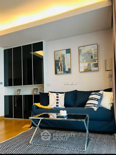 Modern living room with stylish decor and cozy seating area