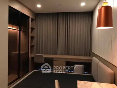 Modern study room with elegant lighting and built-in desk