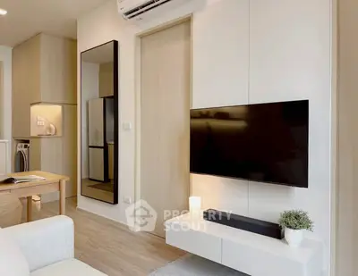 Modern living room with sleek TV setup and stylish decor