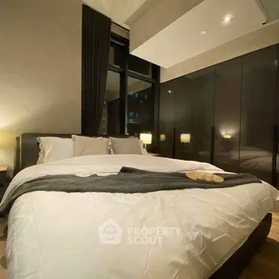 Luxurious modern bedroom with elegant decor and ambient lighting