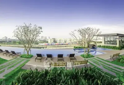 Luxurious rooftop pool with stunning city views and modern lounge area.
