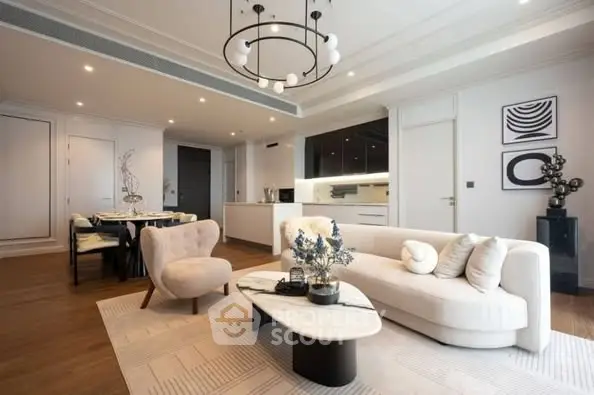 Luxurious modern living room with elegant decor and open kitchen layout