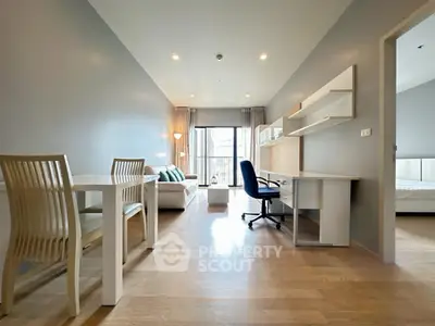 Spacious modern living room with study area and natural light