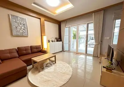 Spacious modern living room with elegant decor and natural light