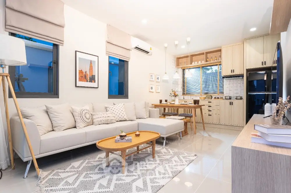 Modern living room with stylish decor and open kitchen layout