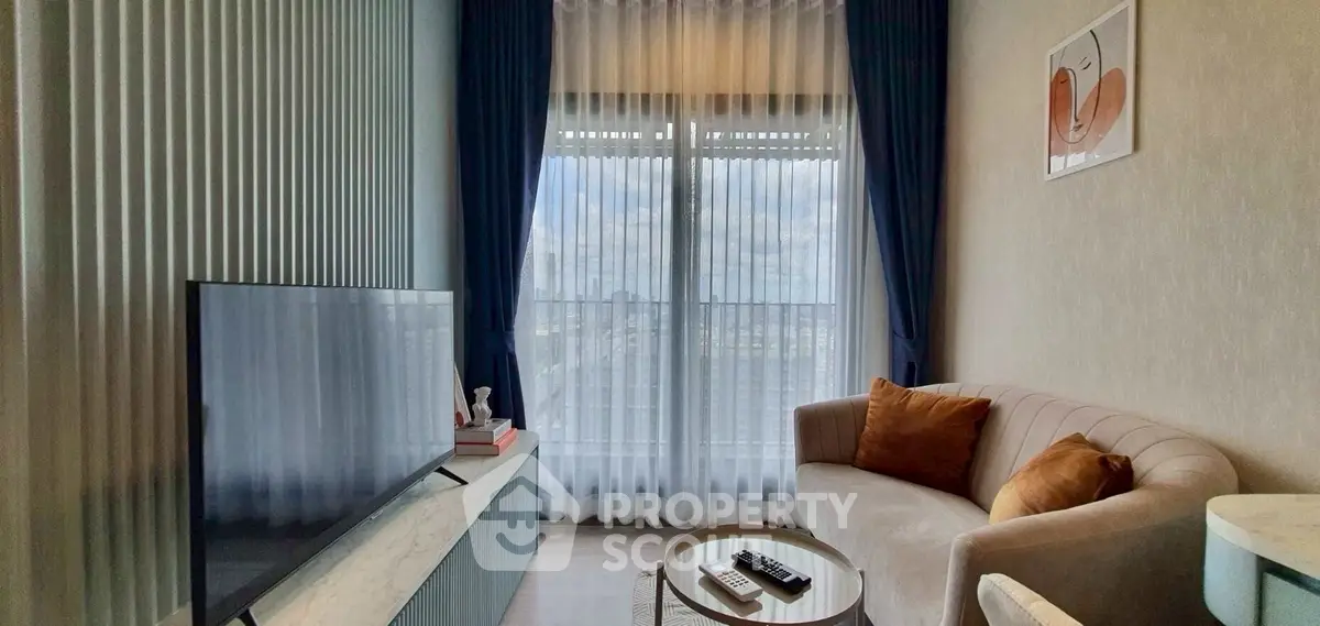 Modern living room with stylish decor and large window view