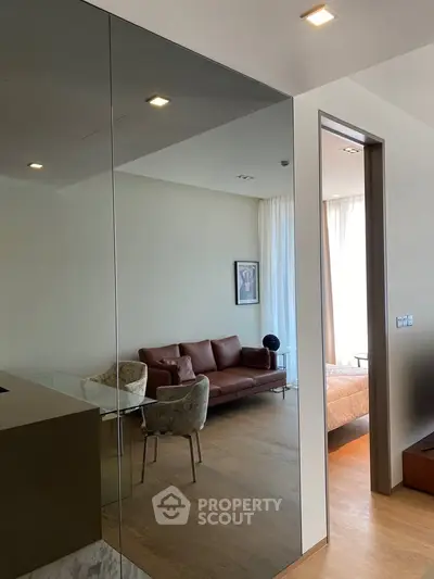 Modern apartment interior with stylish living room and cozy bedroom