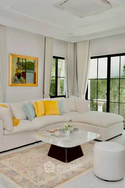 Elegant living room with plush sectional sofa and modern decor