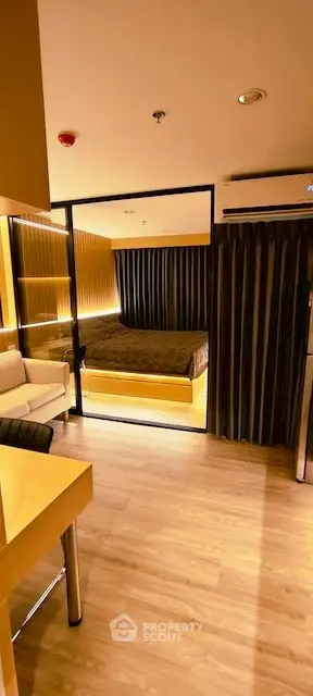 Modern studio apartment with cozy bedroom and stylish furnishings