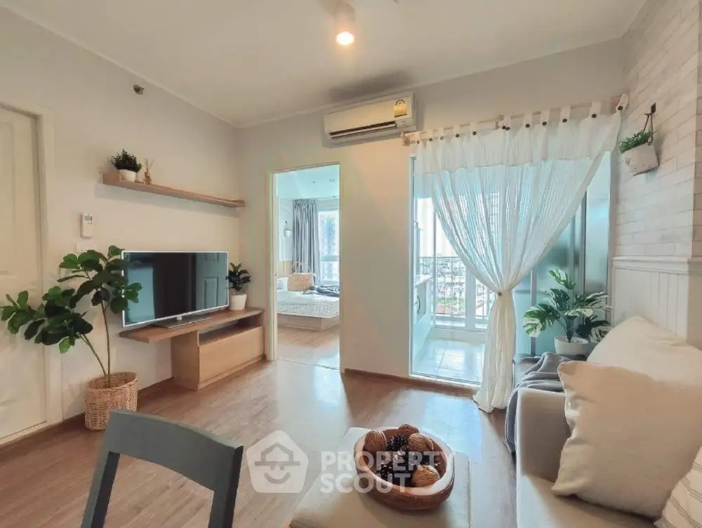 Bright and airy living room with modern decor and balcony view
