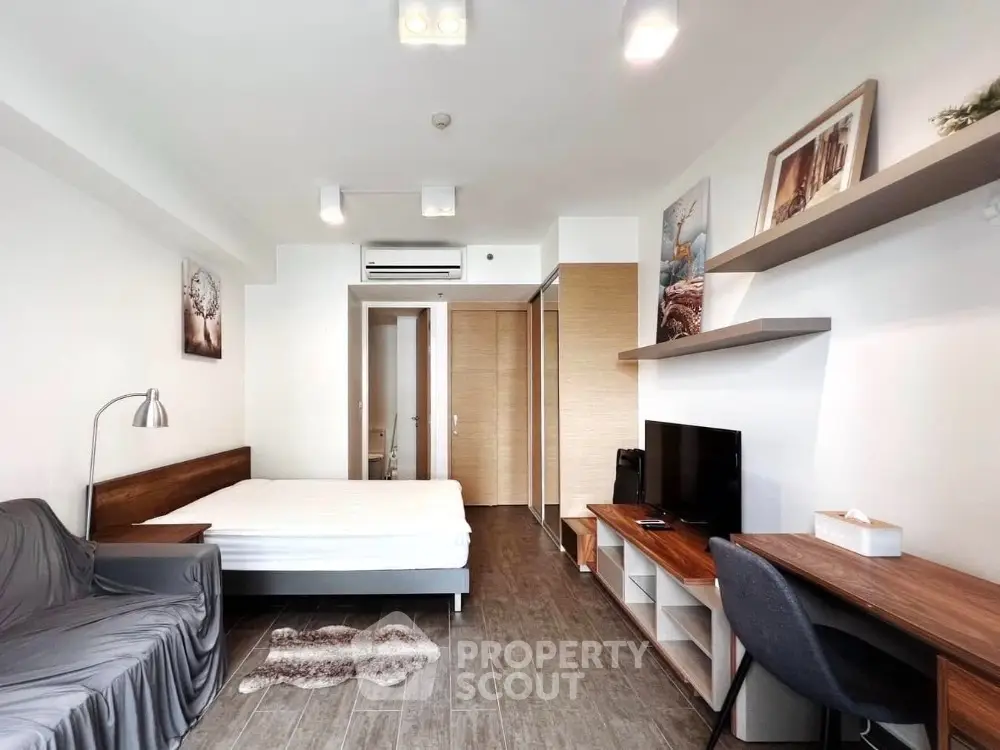 Modern studio apartment with stylish decor and natural light