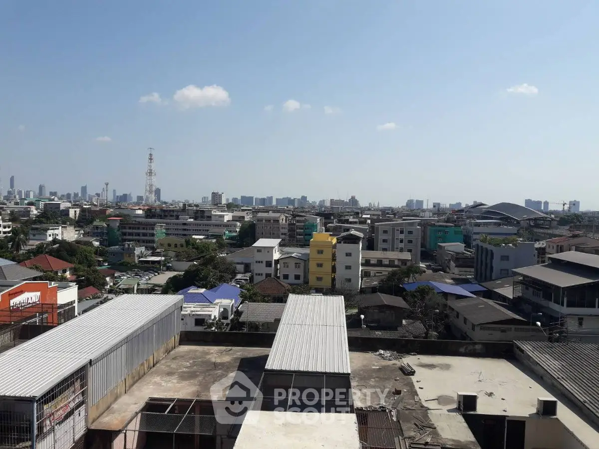 Stunning cityscape view from rooftop showcasing urban skyline and architecture.