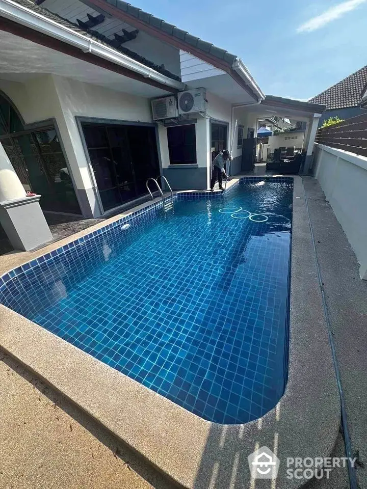 Charming residential property with private swimming pool and spacious outdoor area.