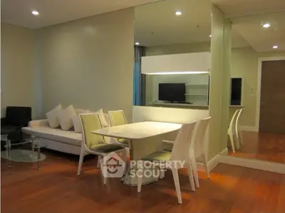 Modern living room with elegant dining area and stylish decor