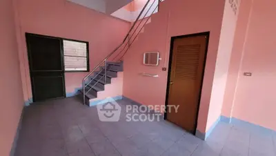 Spacious interior with staircase and modern design, perfect for customization.