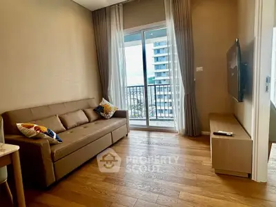 Modern living room with balcony view in high-rise apartment