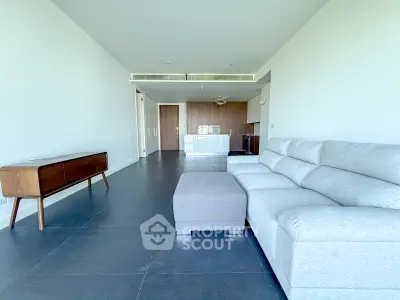 Spacious modern living room with sleek furniture and open layout