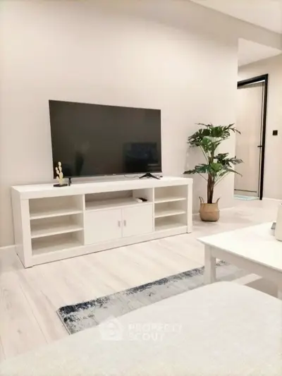 Modern living room with sleek TV setup and stylish decor