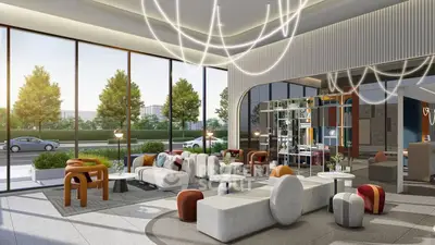 Luxurious modern living room with stylish furniture and large windows offering scenic views.