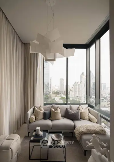 Luxurious modern living room with panoramic city view, elegant decor, and cozy seating area.