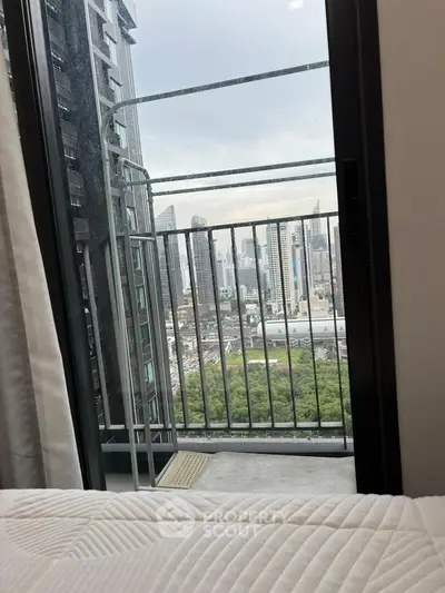 Stunning city view from a modern apartment balcony, perfect for urban living.