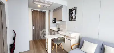 Modern compact living room with integrated kitchen and stylish decor