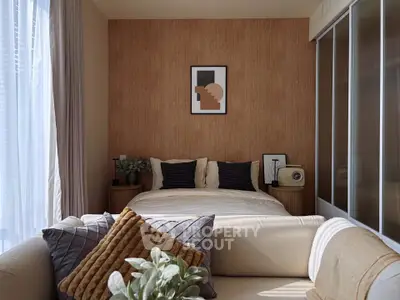 Cozy bedroom with modern decor and natural light, featuring a stylish bed and elegant wall art.