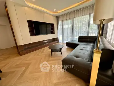 Luxurious modern living room with sleek furniture and large windows