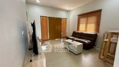 Modern living room with sleek furniture and natural light