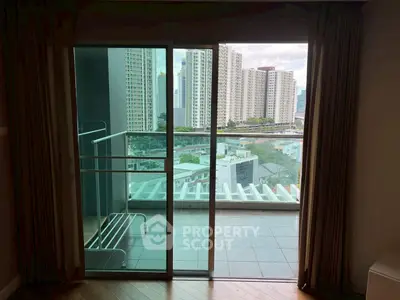 Spacious balcony with city view in modern apartment