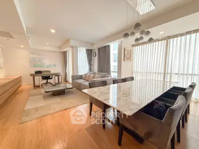 Spacious modern living room with elegant dining area and natural light