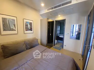 Modern bedroom with ensuite bathroom in a stylish apartment