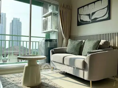 Chic living room with cozy sofa, modern decor, and city view balcony.