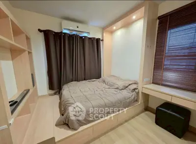 Cozy bedroom with built-in storage and natural light