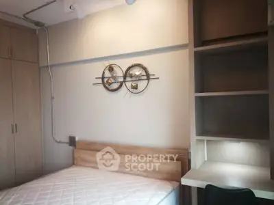 Modern bedroom with stylish decor and built-in storage solutions