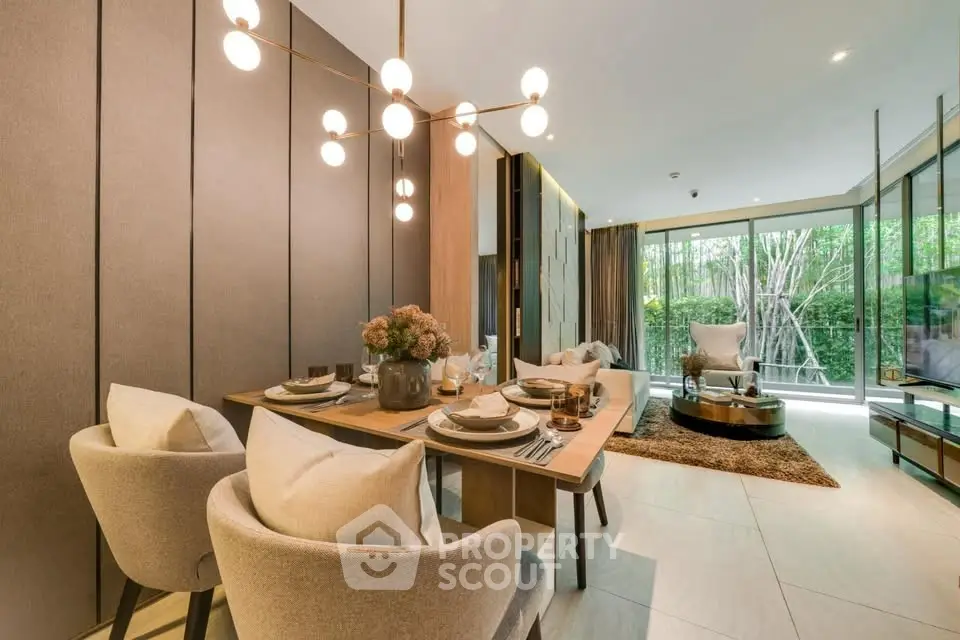 Luxurious open-plan living and dining area with modern decor and garden view.