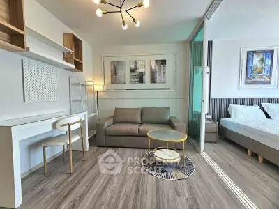 Modern studio apartment with stylish living area and cozy bedroom, featuring elegant decor and contemporary furnishings.