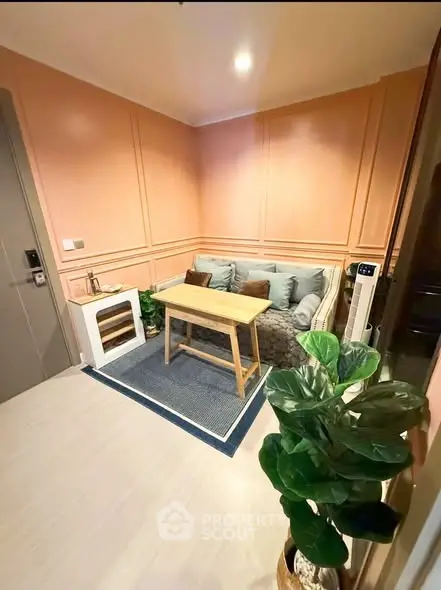 Cozy living room with stylish decor and comfortable seating in modern apartment.