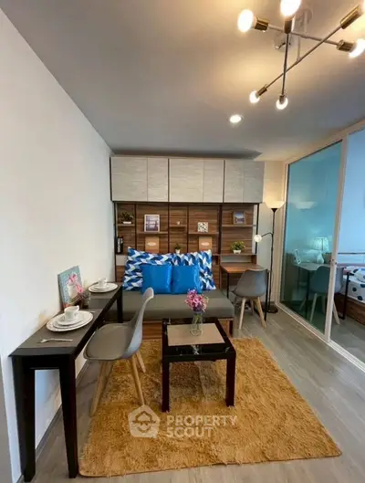 Modern living room with stylish decor and cozy seating area, perfect for relaxation and entertaining.