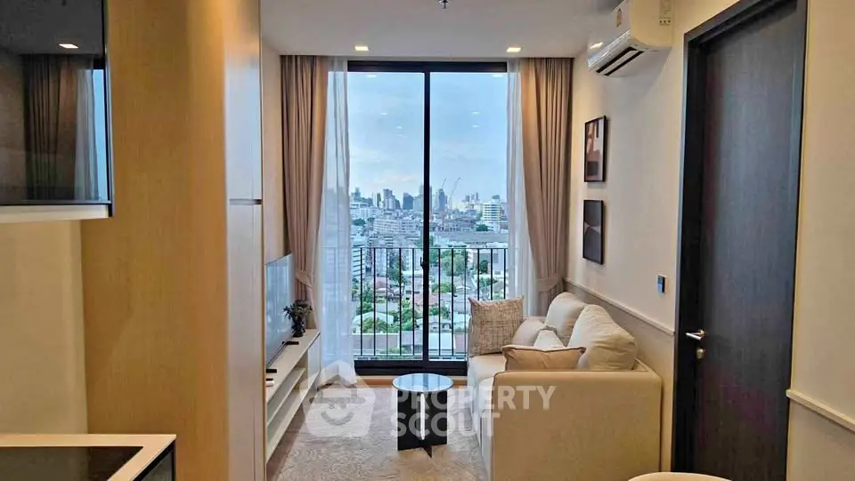 Modern living room with city view, cozy sofa, and sleek decor in a high-rise apartment.