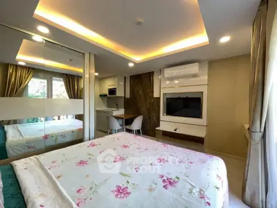 Modern bedroom with elegant lighting and mirrored wardrobe in stylish apartment