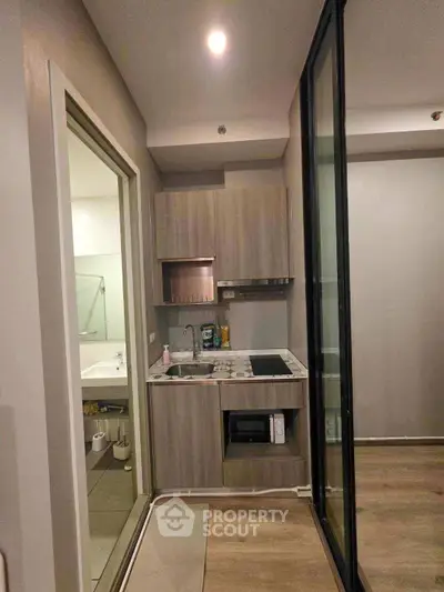 Modern living room with stylish decor and ambient lighting