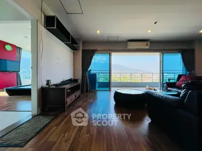 Spacious living room with stunning mountain view and modern decor