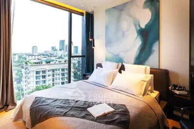Luxurious bedroom with stunning city view and modern decor