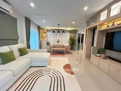 Spacious modern living room with elegant decor and cozy seating area