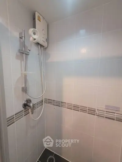 Modern bathroom with sleek shower and water heater