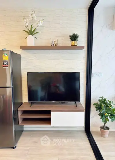 Modern living room with sleek TV setup and stylish decor